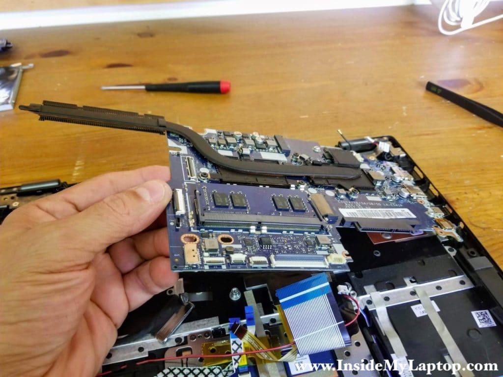 Remove the motherboard.