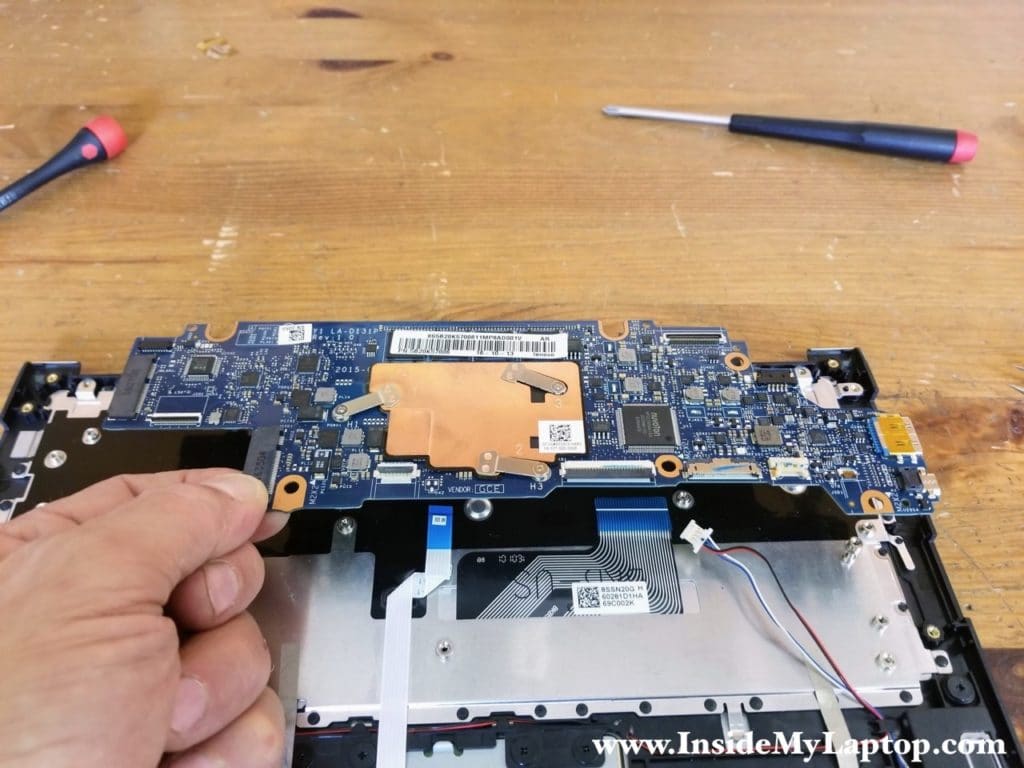 Remove the motherboard.