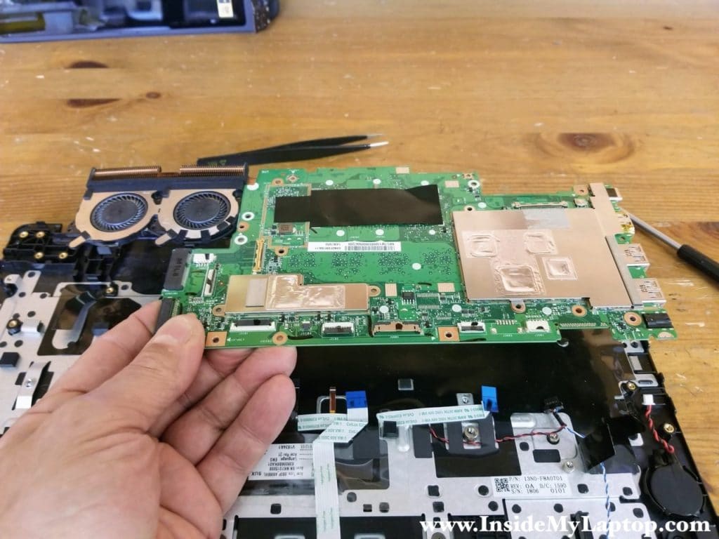 Remove the motherboard.