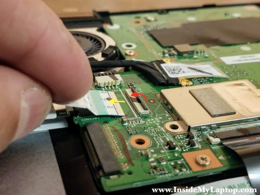 Here's how to disconnect the I/O cable from the motherboard.