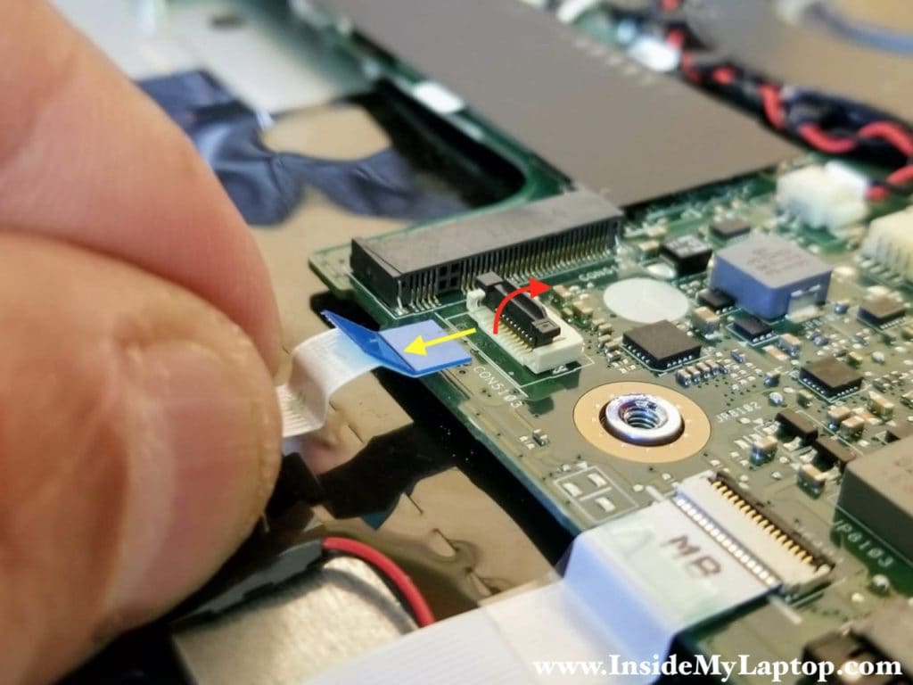 How to unlock the hard drive cable connector and release the cable.