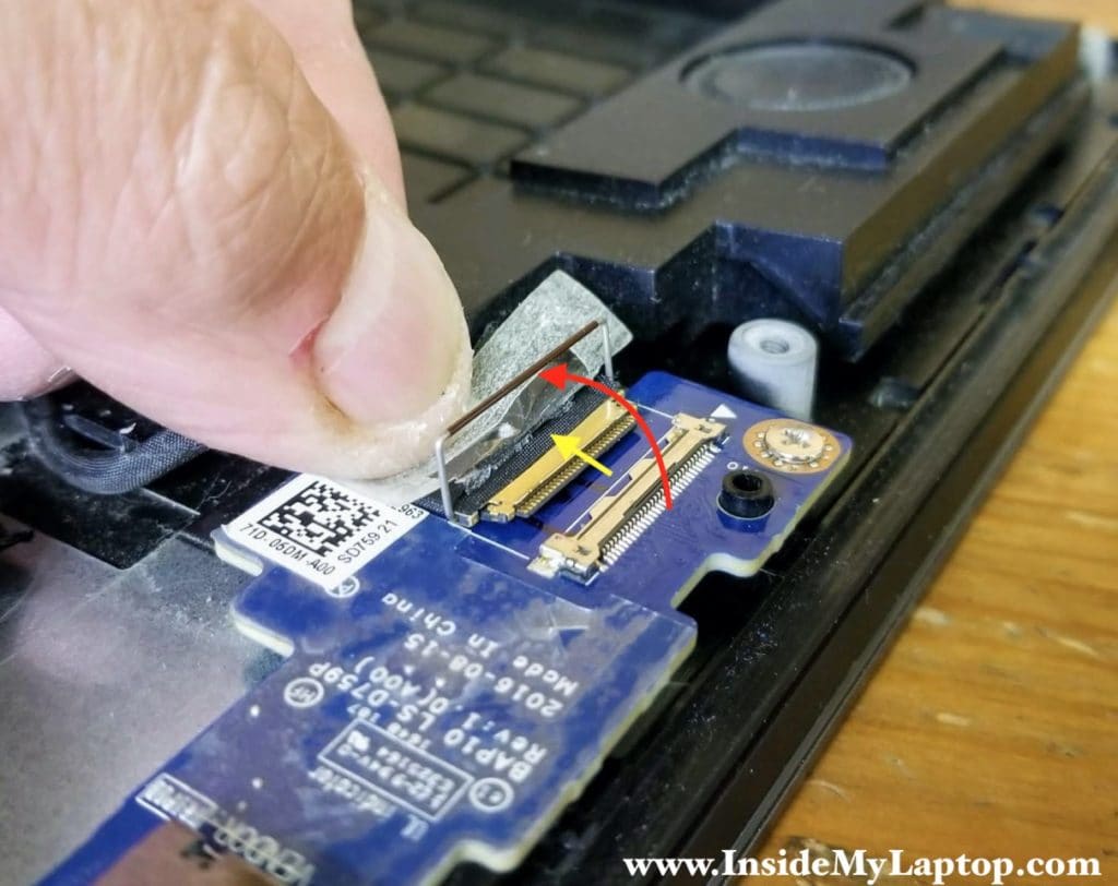 Here's how to disconnect the I/O board cable.