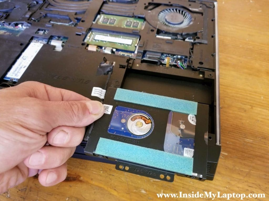 Remove the 2.5" hard drive assembly with the cable attached to it.