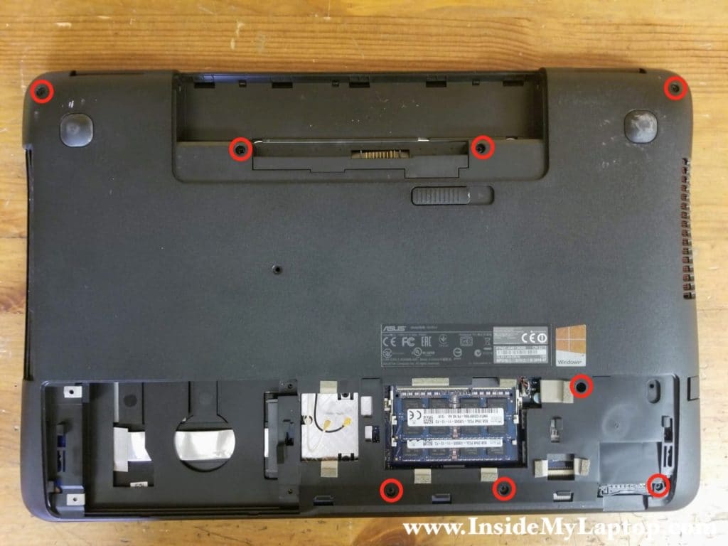Remove all screws from the laptop base.