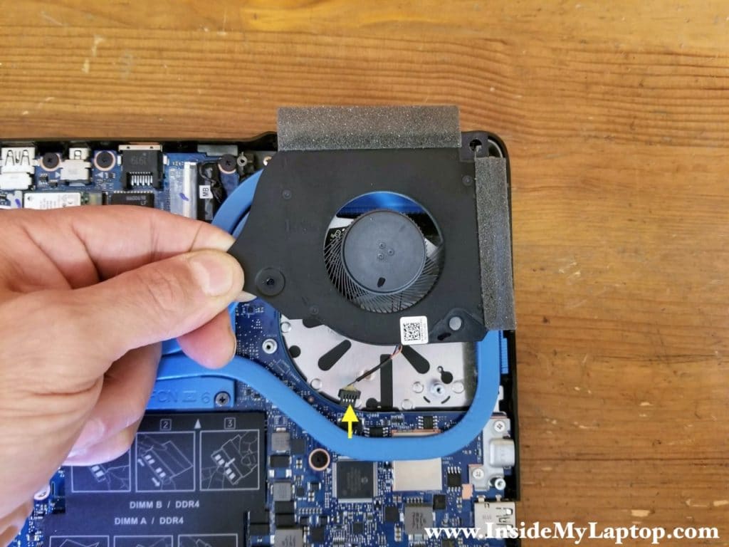 Lift up the CPU fan, disconnect the cable from the motherboard and remove the fan.
