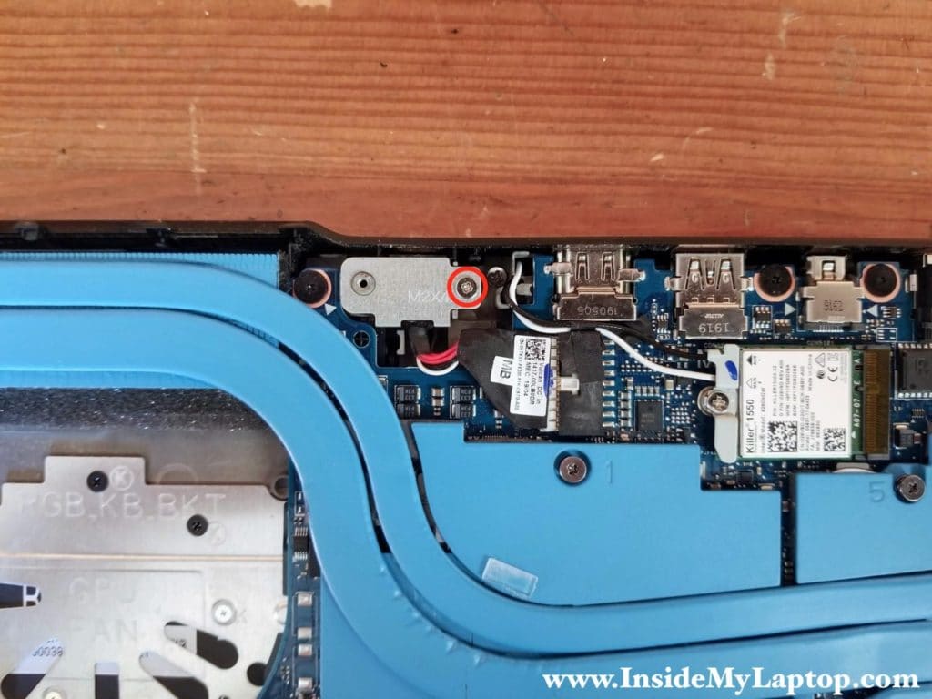 Remove one screw from the DC power jack cover and remove the cover.