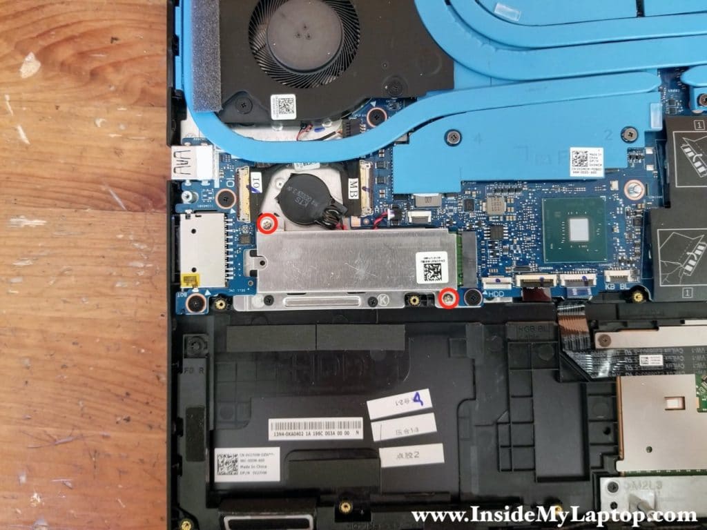 Remove two screw from the SSD cover and remove the cover.