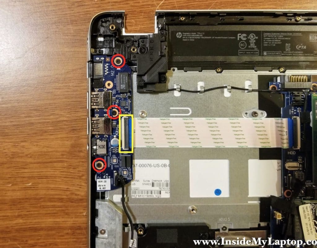 Remove three screws securing the USB/Audio/LAN board and disconnect the I/O cable.