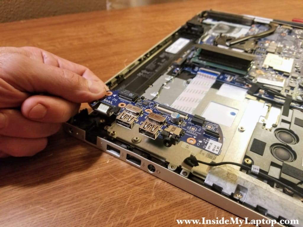Lift up and remove the USB/Audio/LAN board.