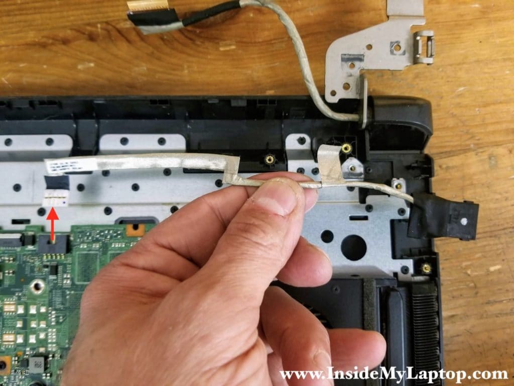 Disconnect the DC jack cable from the motherboard and remove it.