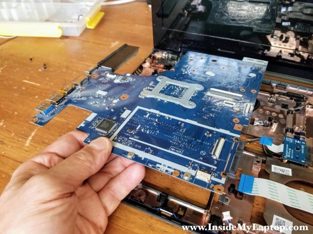 Lift up and remove the motherboard.