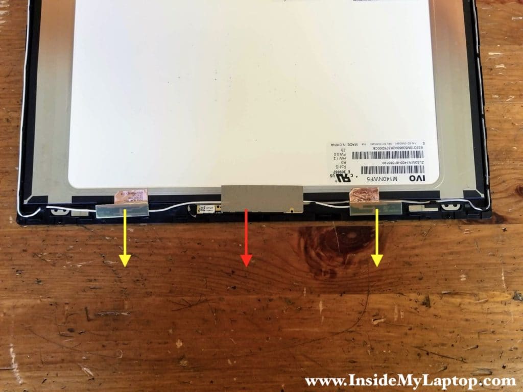 Separate the web camera board, Wi-Fi antennas and cables from the bezel.