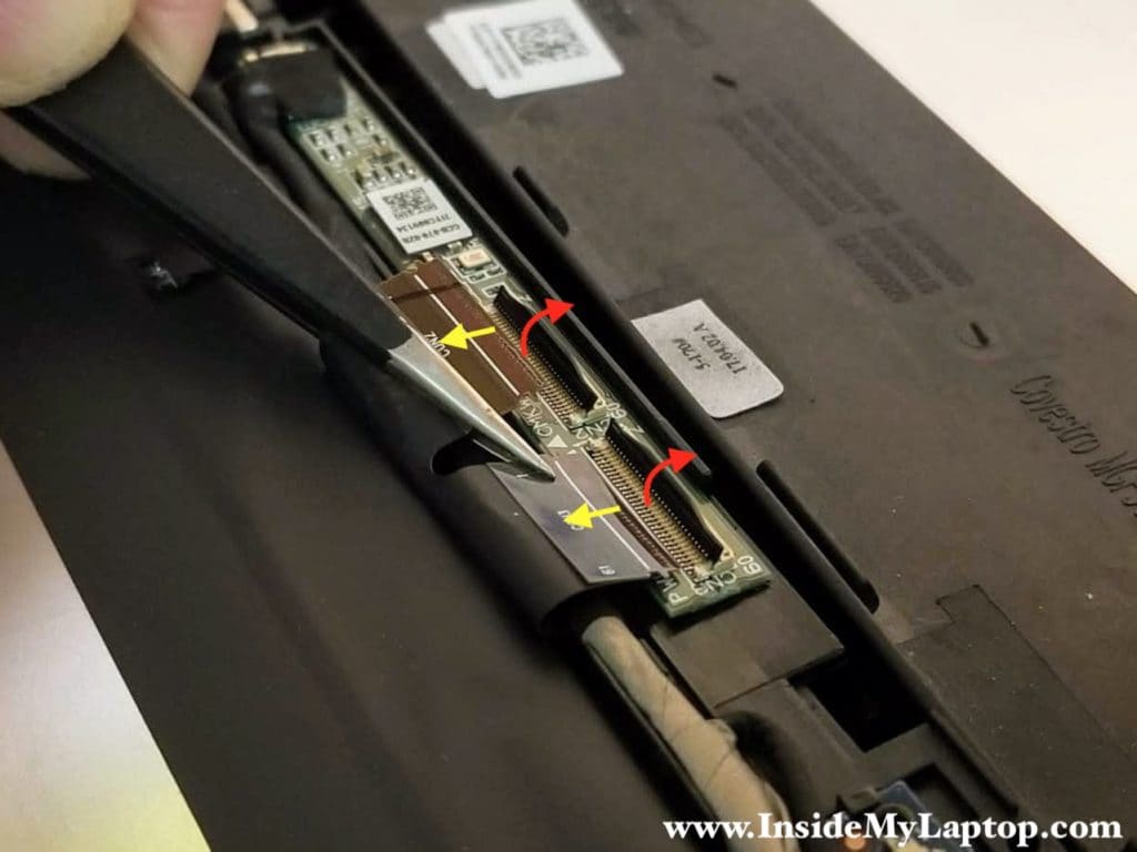 Unlock connectors on the digitizer board and pull both cables out.