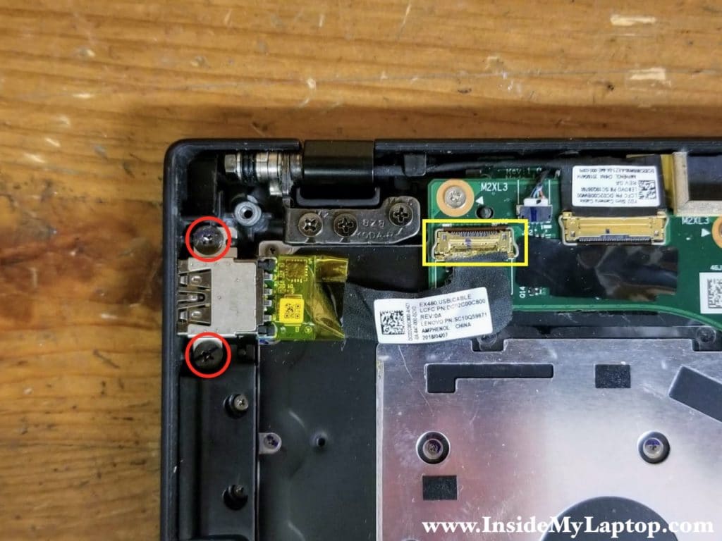 Remove two screws securing the USB board and disconnect the cable.