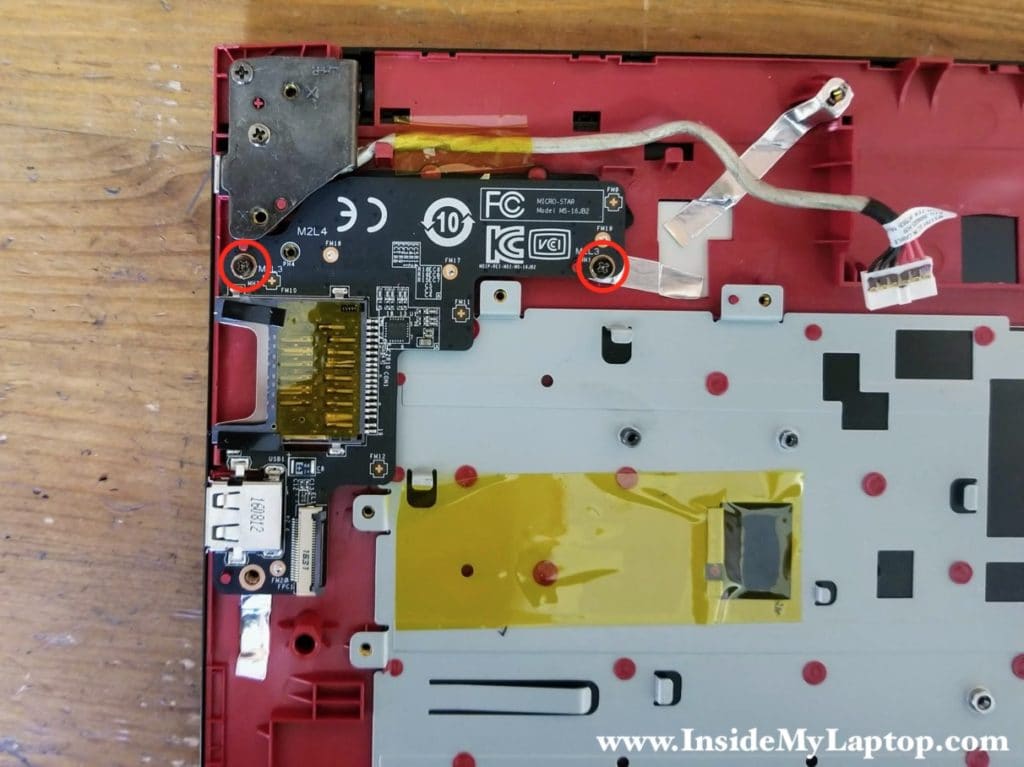 Remove two screws securing the USB SD card reader board.