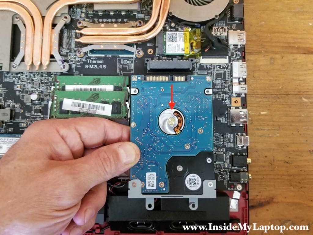 Disconnect the hard drive from the SATA port and remove the drive.