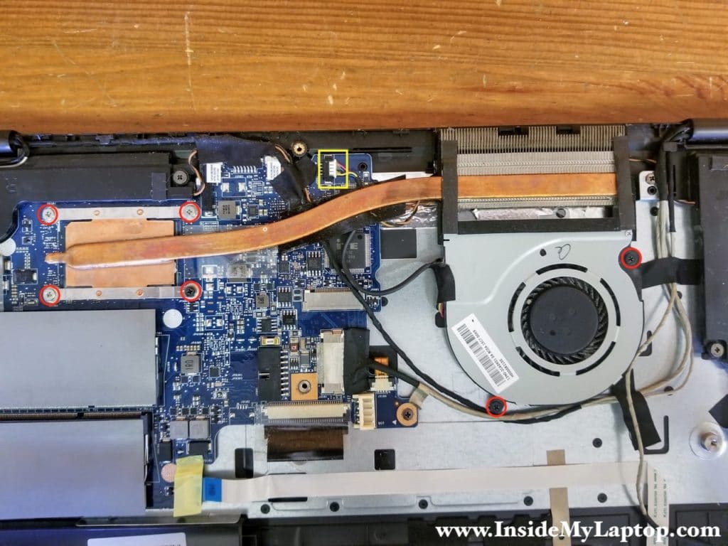 Remove fan/heatsink screws and disconnect the cable.
