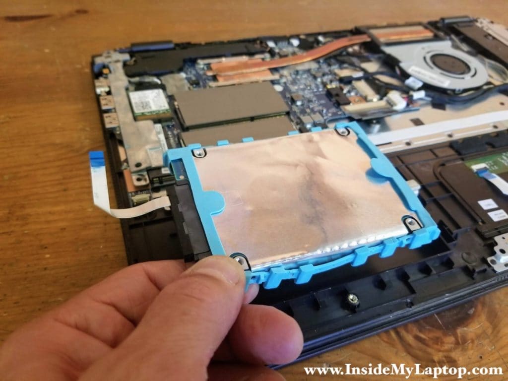 Remove the hard drive assembly with the cable attached.