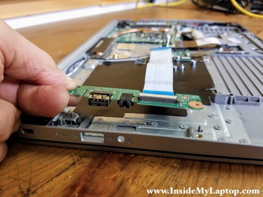 Lift up and remove the USB audio jack board.