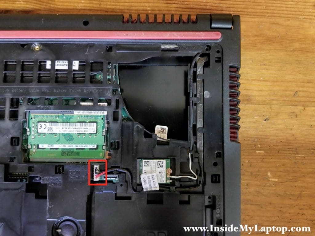 Disconnect the DC power jack cable from the motherboard.
