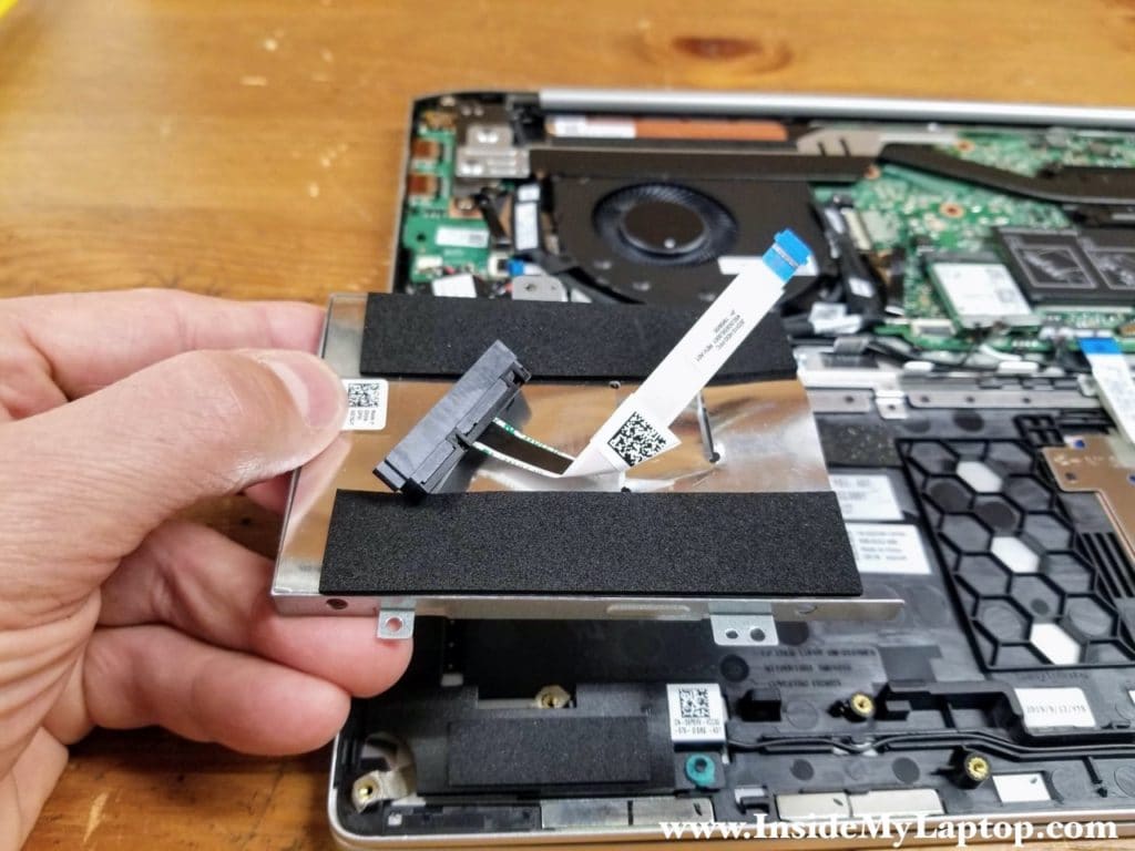 Remove the hard drive caddy and the SATA cable.