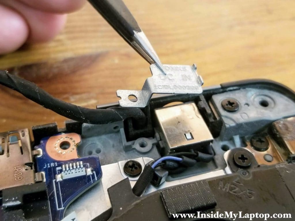 Remove the DC-IN jack mounting bracket.