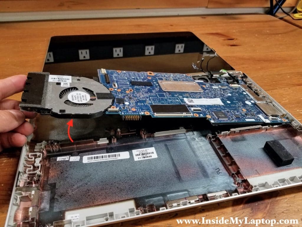 Start lifting up the motherboard from the fan side. Remove the motherboard from the base assembly.
