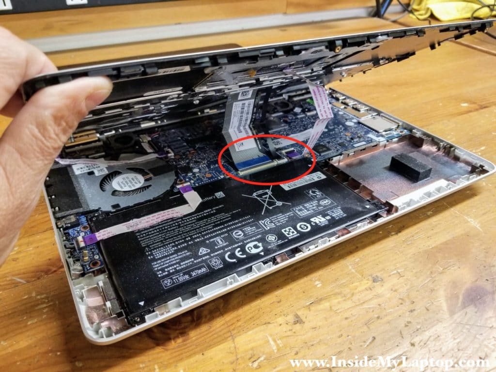The keyboard and touchpad are still attached to the motherboard.