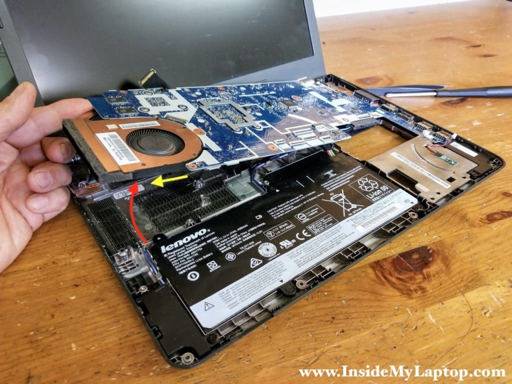 Lift up the left side of the motherboard and remove it from the base.
