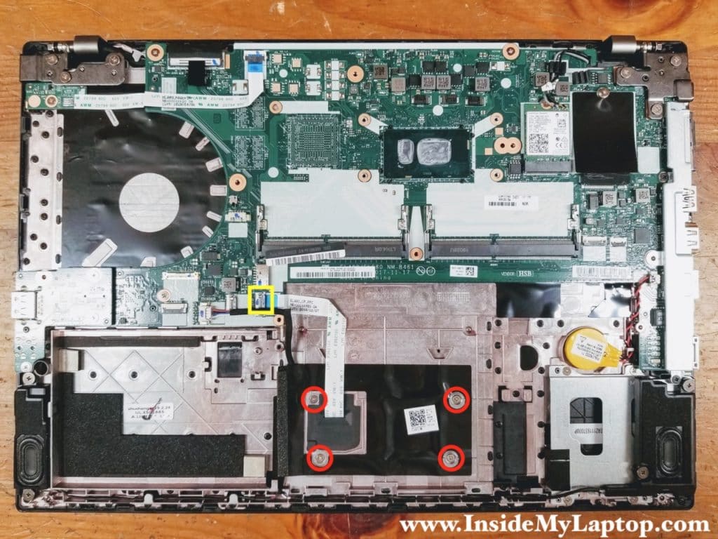 Remove four screw securing the touchpad and disconnect the touchpad cable from the motherboard.