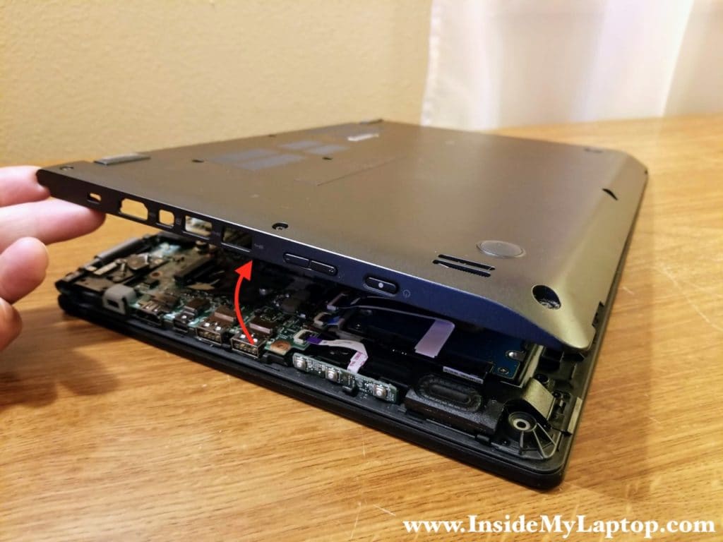 Lift up and remove the bottom cover.