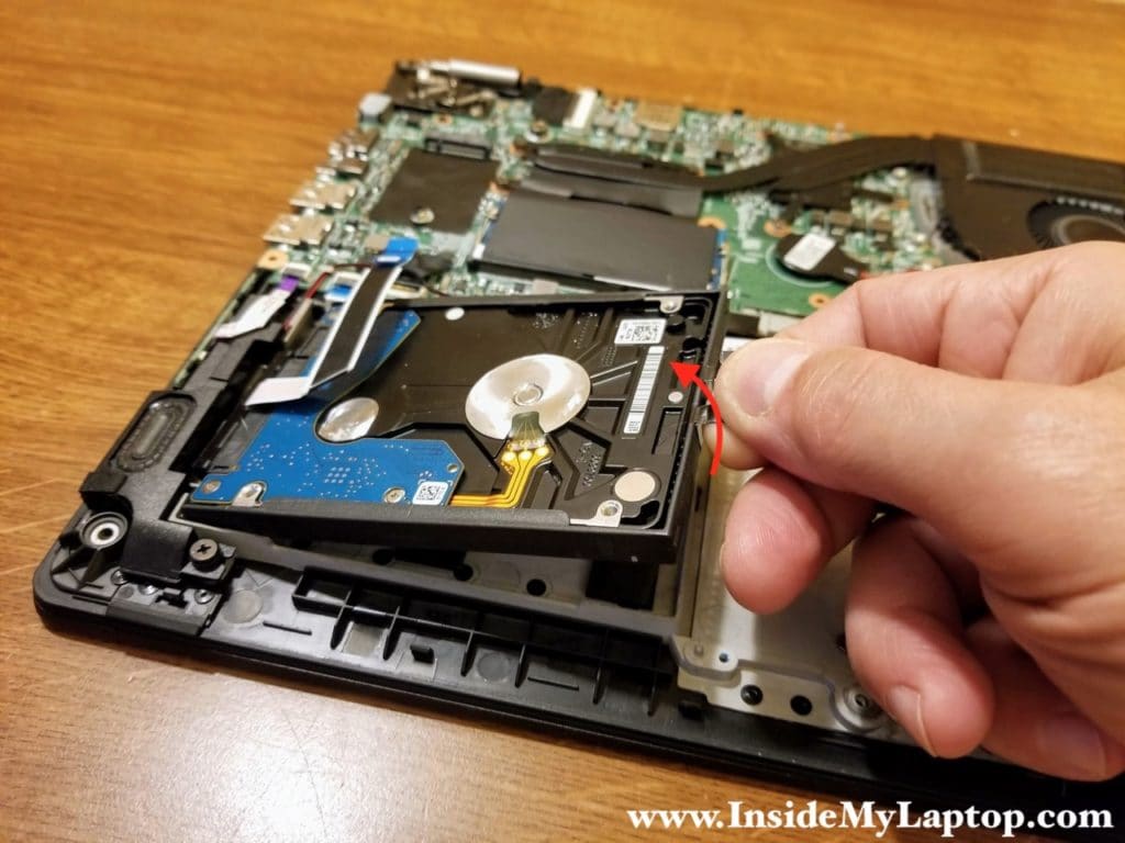 Lift up and remove the hard drive.