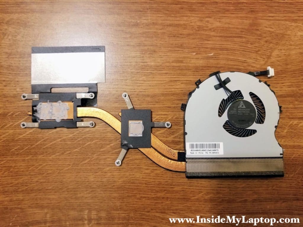 Heatsink/fan assembly removed. FRU part number is 00PA931.