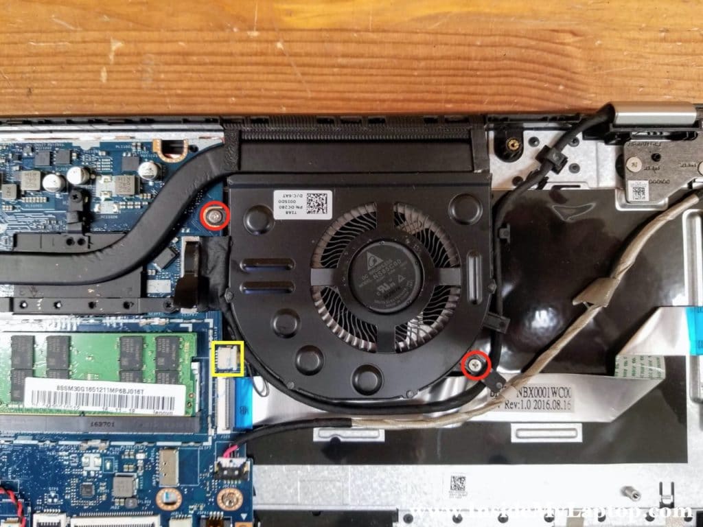 Remove two screws from the cooling fan.