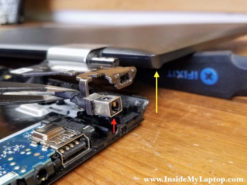 Lift up the DC jack from the case and remove it.