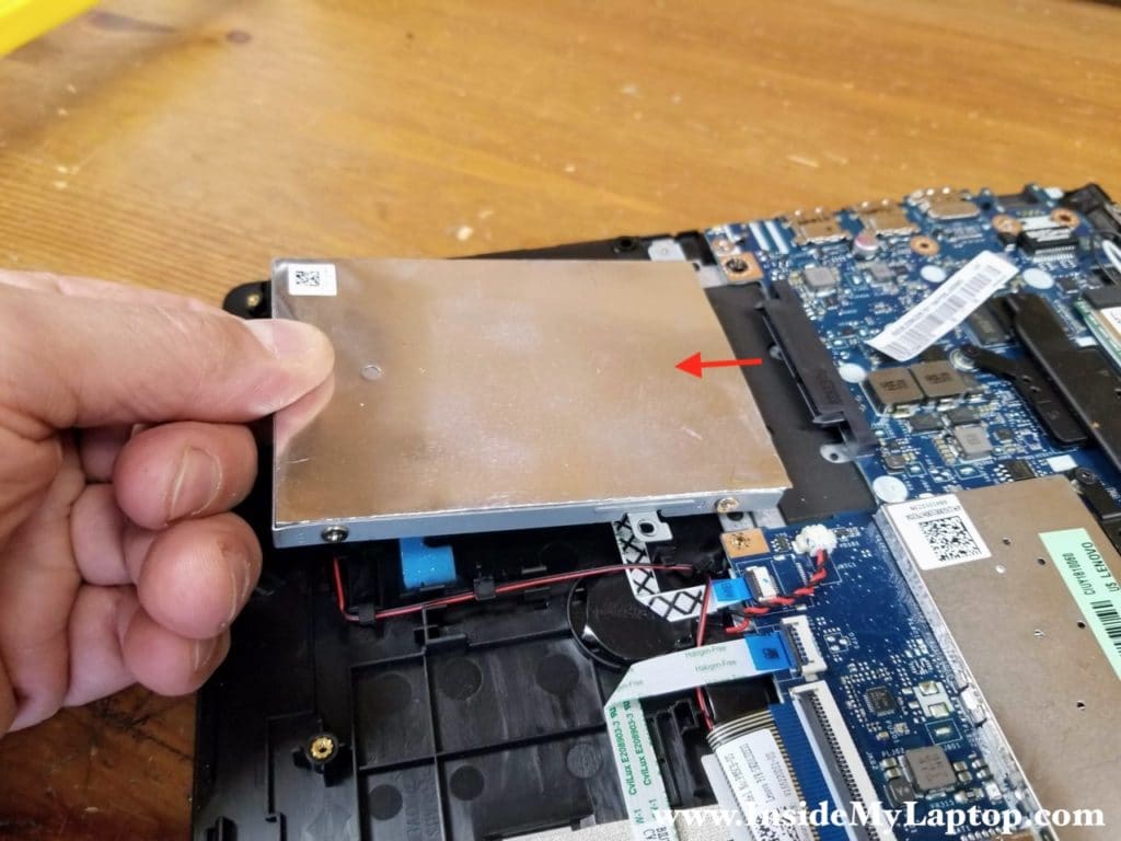 Lift up the rear side of the hard drive and pull it out of the SATA slot.