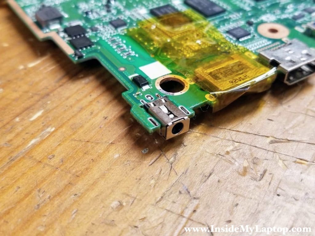 Fit the new DC jack on the motherboard. Make sure the orientation of the jack is correct and it seats properly.