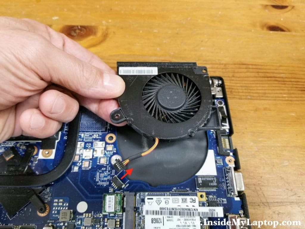 Disconnect the fan cable from the motherboard and remove the fan.