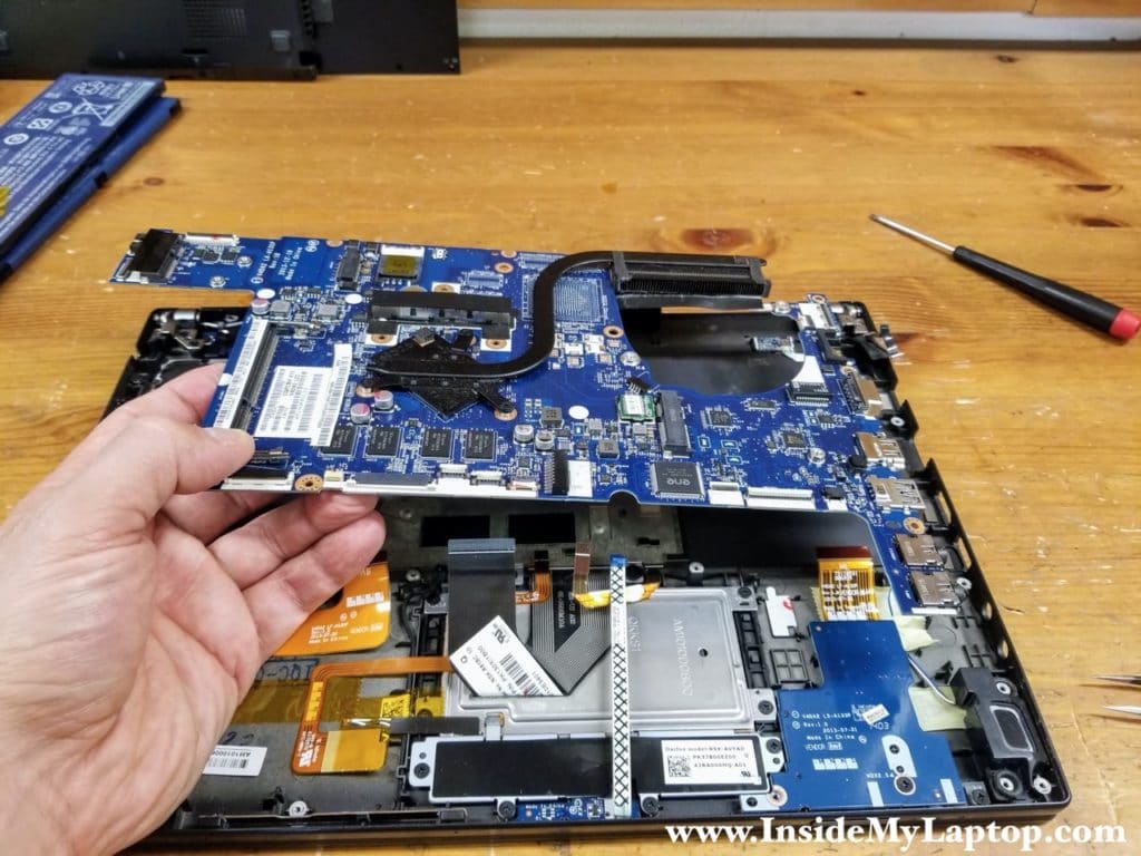 Remove the motherboard from the top case assembly.