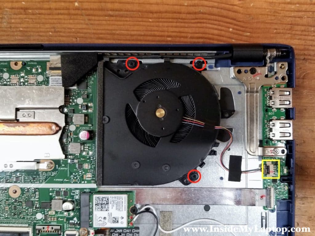 Remove three screws securing the cooling fan. Disconnect the fan cable from the USB board.