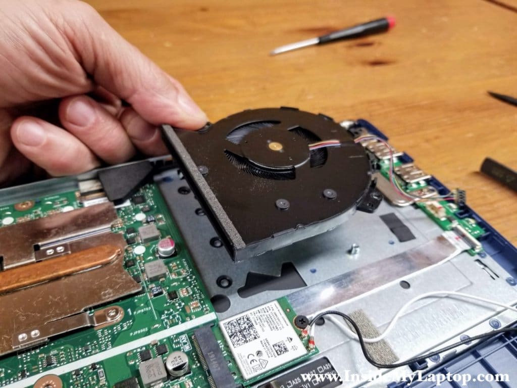 Lift up and remove the cooling fan.