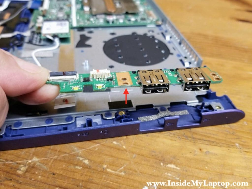 Lift up and remove the USB board.