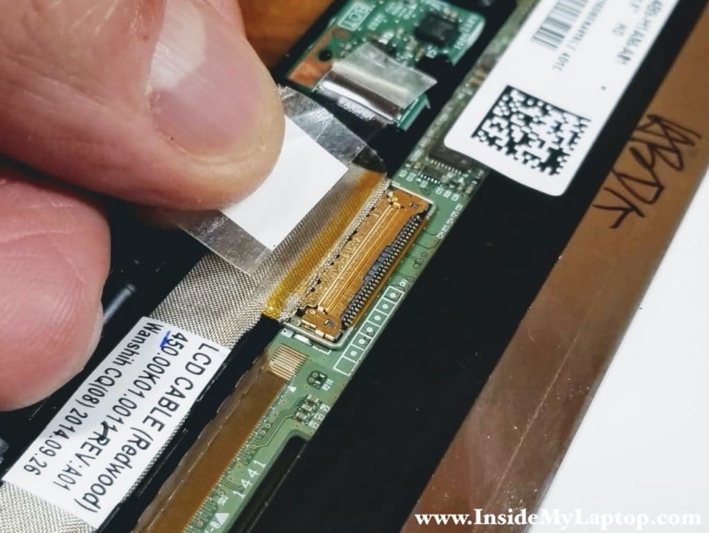 The display cable also has to be unlocked before it can be disconnected from the screen.