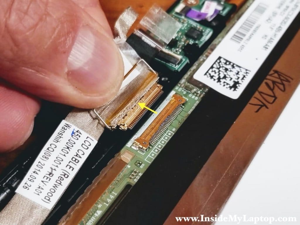 Disconnect the display cable from the LCD screen.