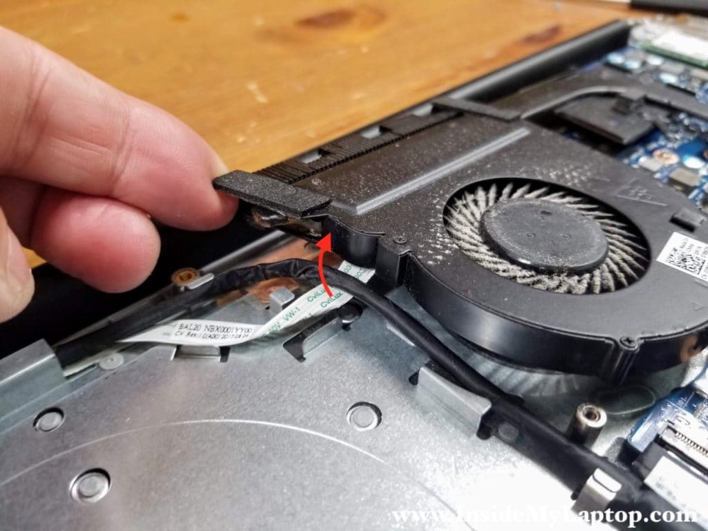 Carefully separate the fan from the cable.