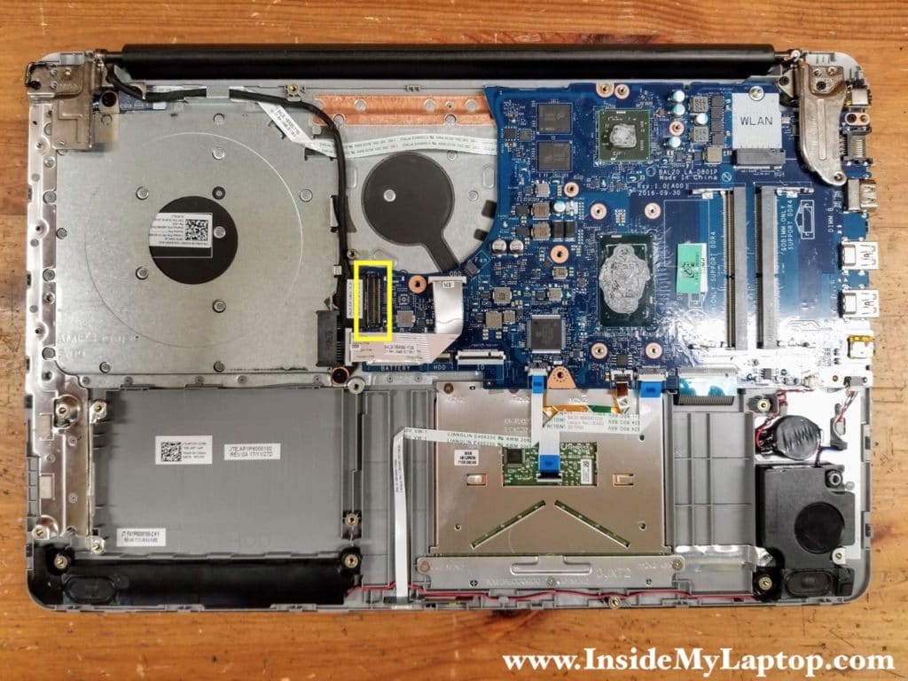 Disconnect the display video cable from the motherboard. Un-route the display cable from the guided path on the top case.