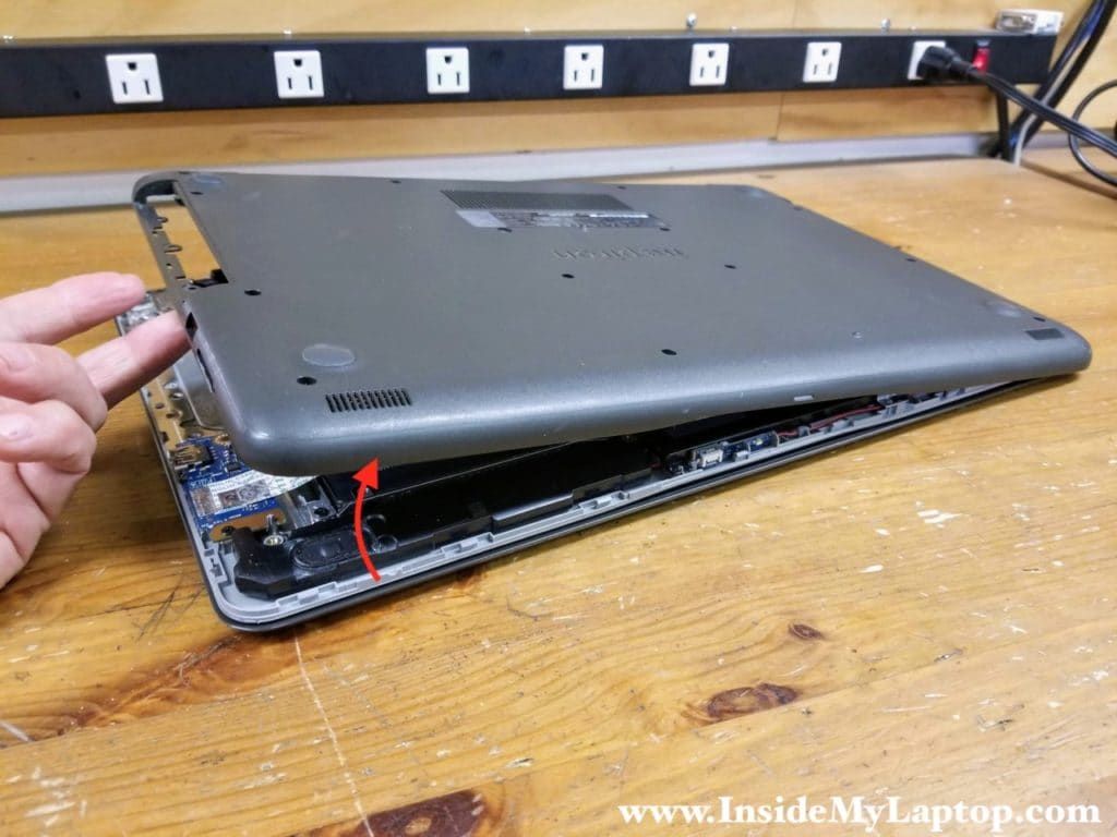 Continue removing the base cover with your hands.