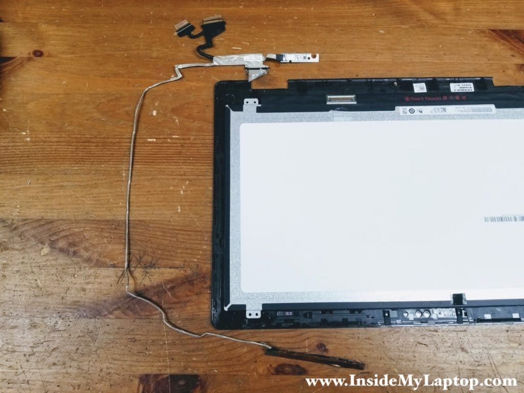 Remove the webcam/video hardness with the Windows home button board and webcam board attached.
