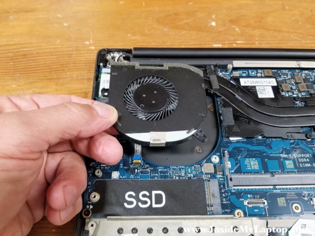 Lift up and remove the right cooling fan.