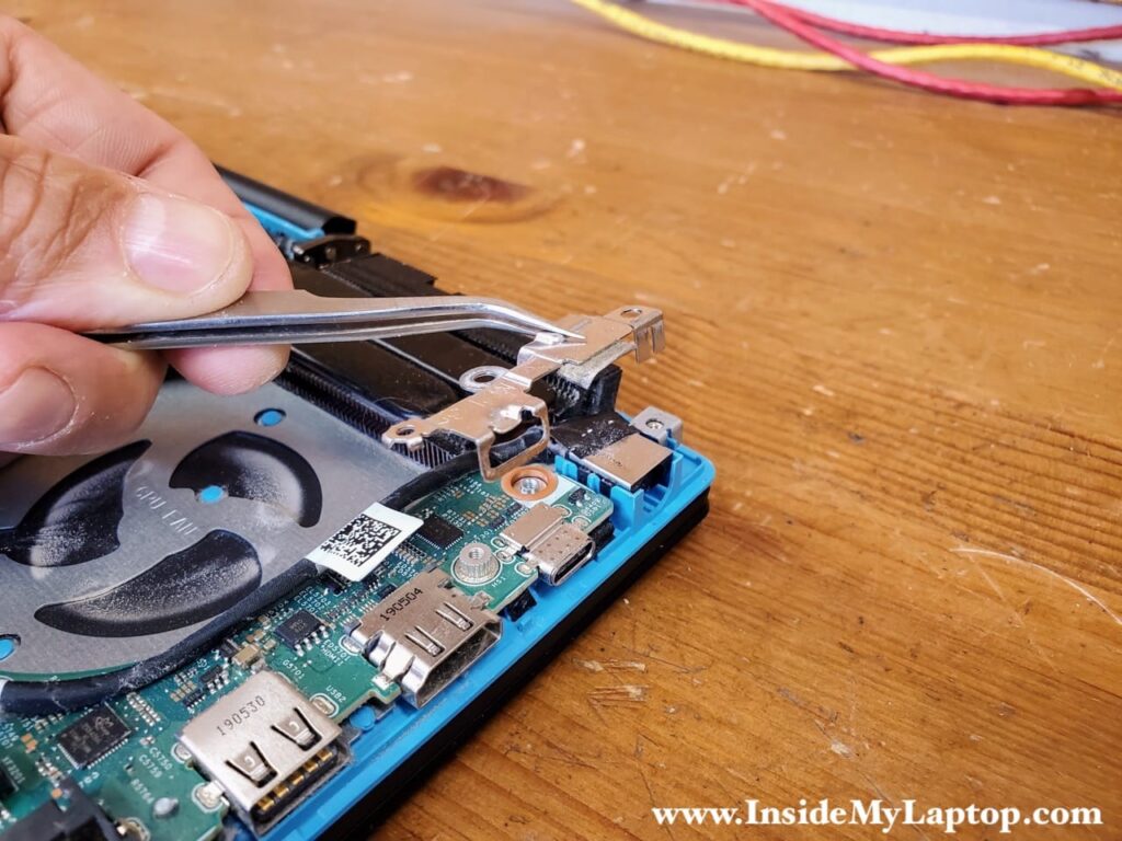 Lift up and remove the bracket.